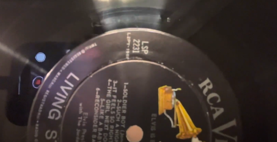 View of a spinning RCA Living Stereo vinyl record, with visible track listing and logo.