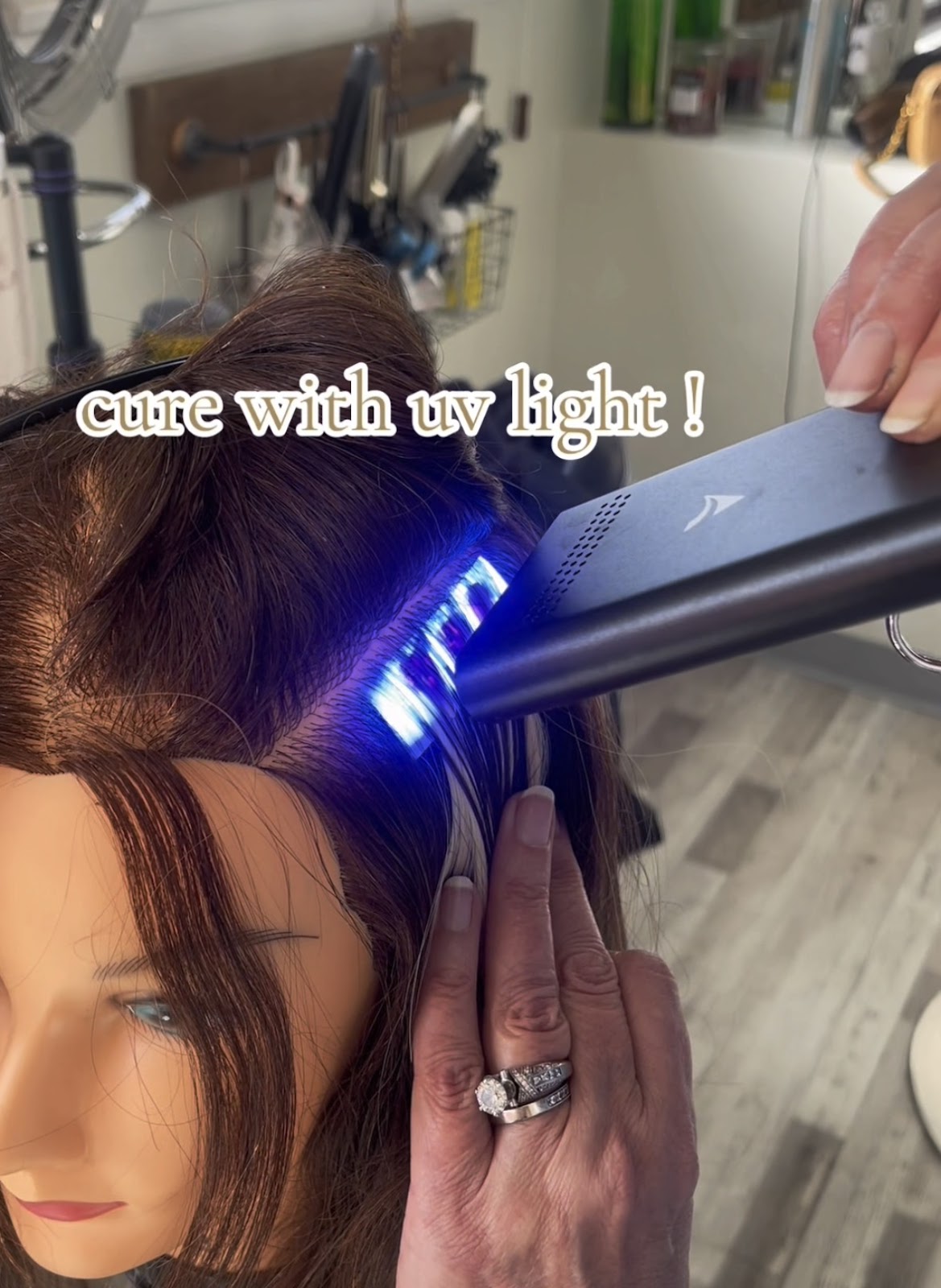 Alt text: Installing V-light hair extensions