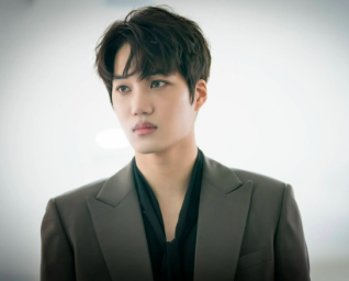 This contains an image of EXO Kai