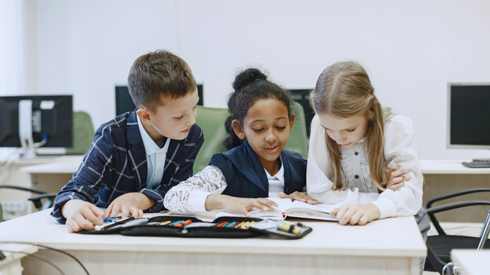 Pupils on latop at school
