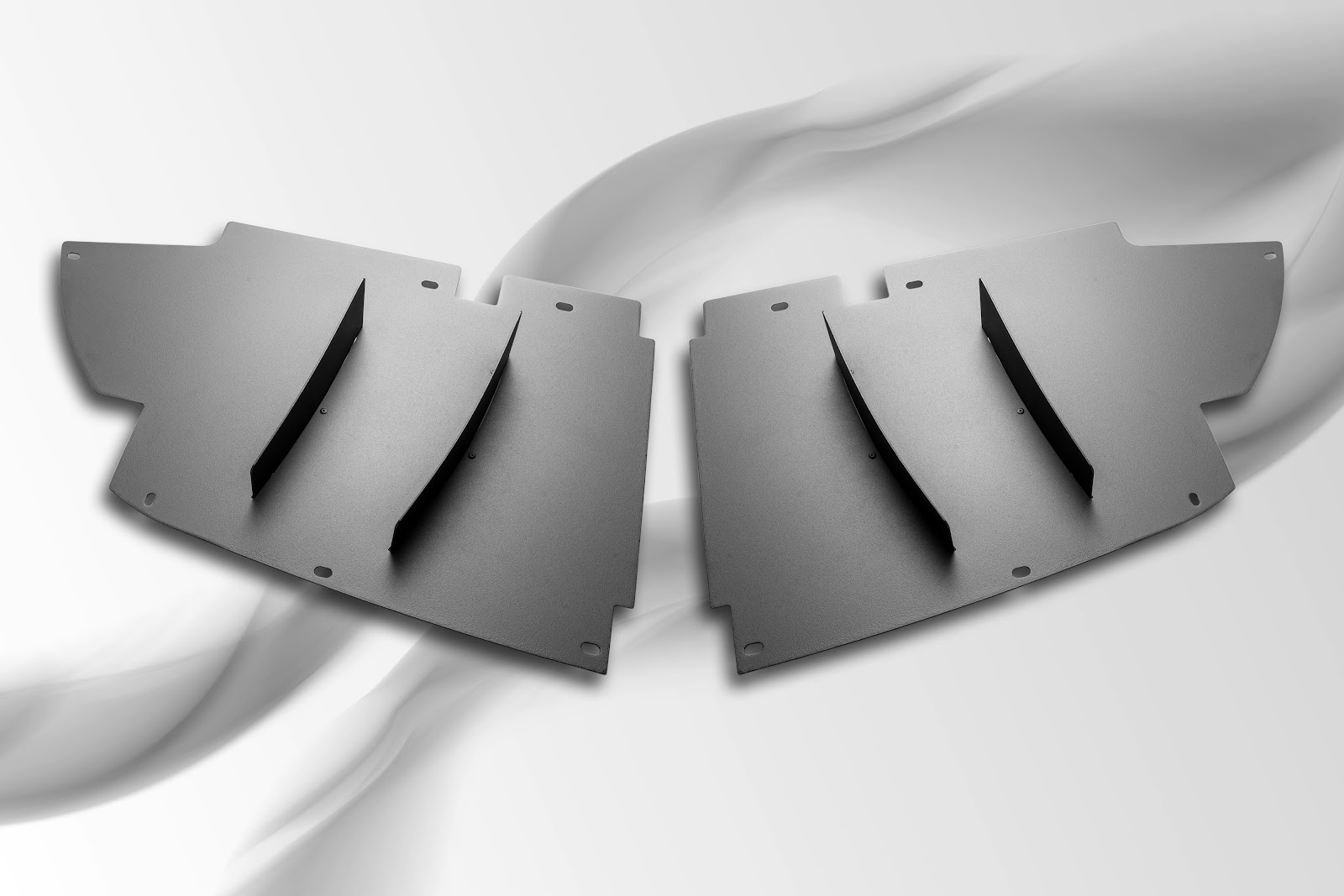 Aftermarket Porsche 718 GT4 diffuser panels from Verus Engineering.