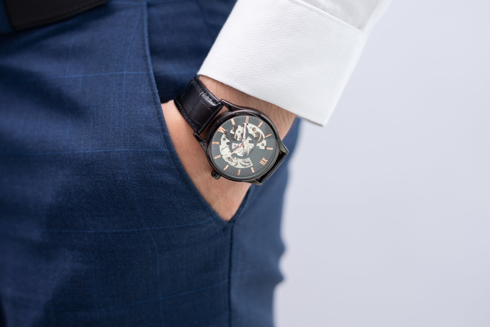 Man with a well-fitted watch, perfect for a milestone gift