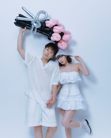 A photo of  HyunA and Yong Junhyung taking a photo shoot