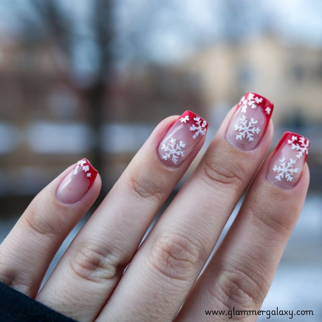 Snowflake Nails having Red French Tips with White Snowflakes
