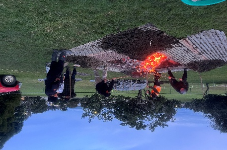 A group of people working on a fire AI-generated content may be incorrect.