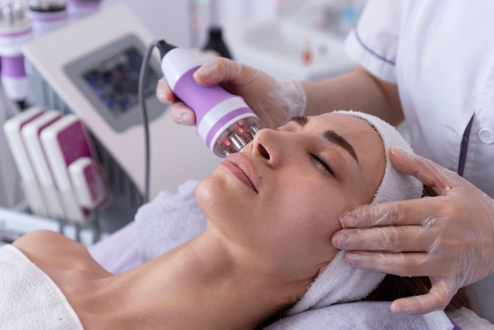 A young woman relaxing during her in-office radio frequency treatment.