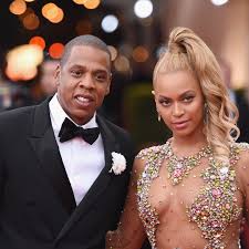 This contains an image of Beyoncé and Jay-Z