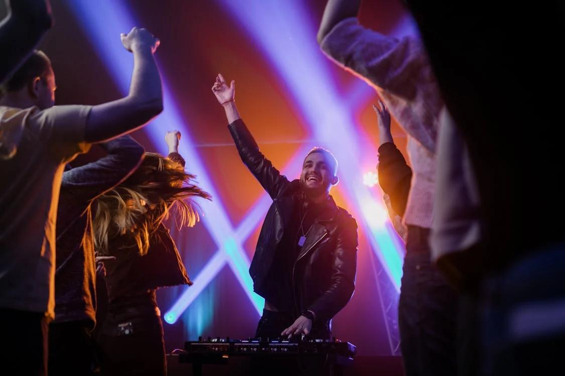 Photo by Alena Darmel: https://www.pexels.com/photo/people-dancing-on-the-music-7715628/ 