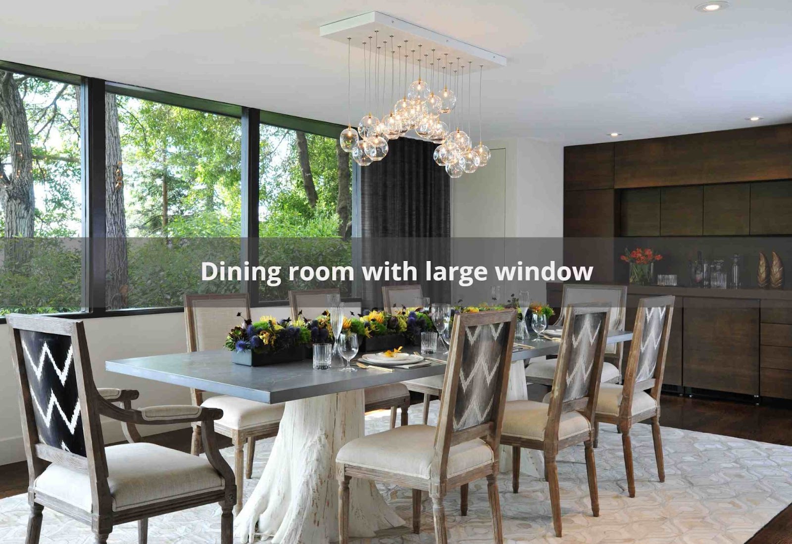 A dining room with the large window glass