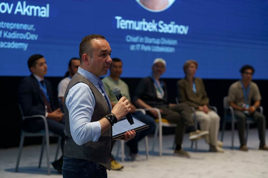 A person speaking into a microphoneAI-generated content may be incorrect.