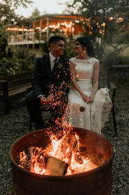 Bride and Groom enjoy smores at North Georgia Wedding Venue