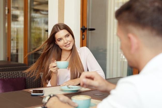 Enjoying Quality Time Together in a Cozy Cafe