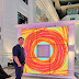 LG celebrates 12 years of OLED innovation by showcasing Isaiah Cacnio's "Fragments" at the National Museum of Natural History.