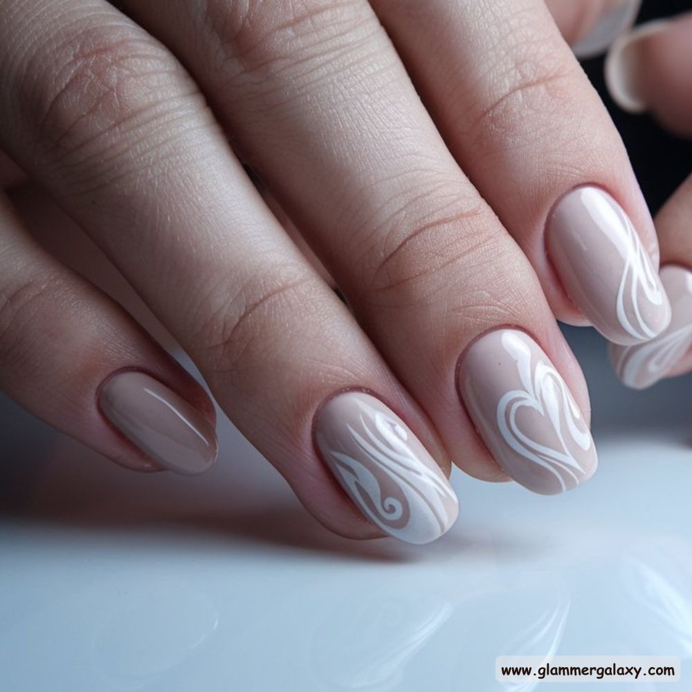 Neutral Nails having Swirls with Heart Design
