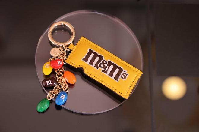 A key chain with candy on it

Description automatically generated