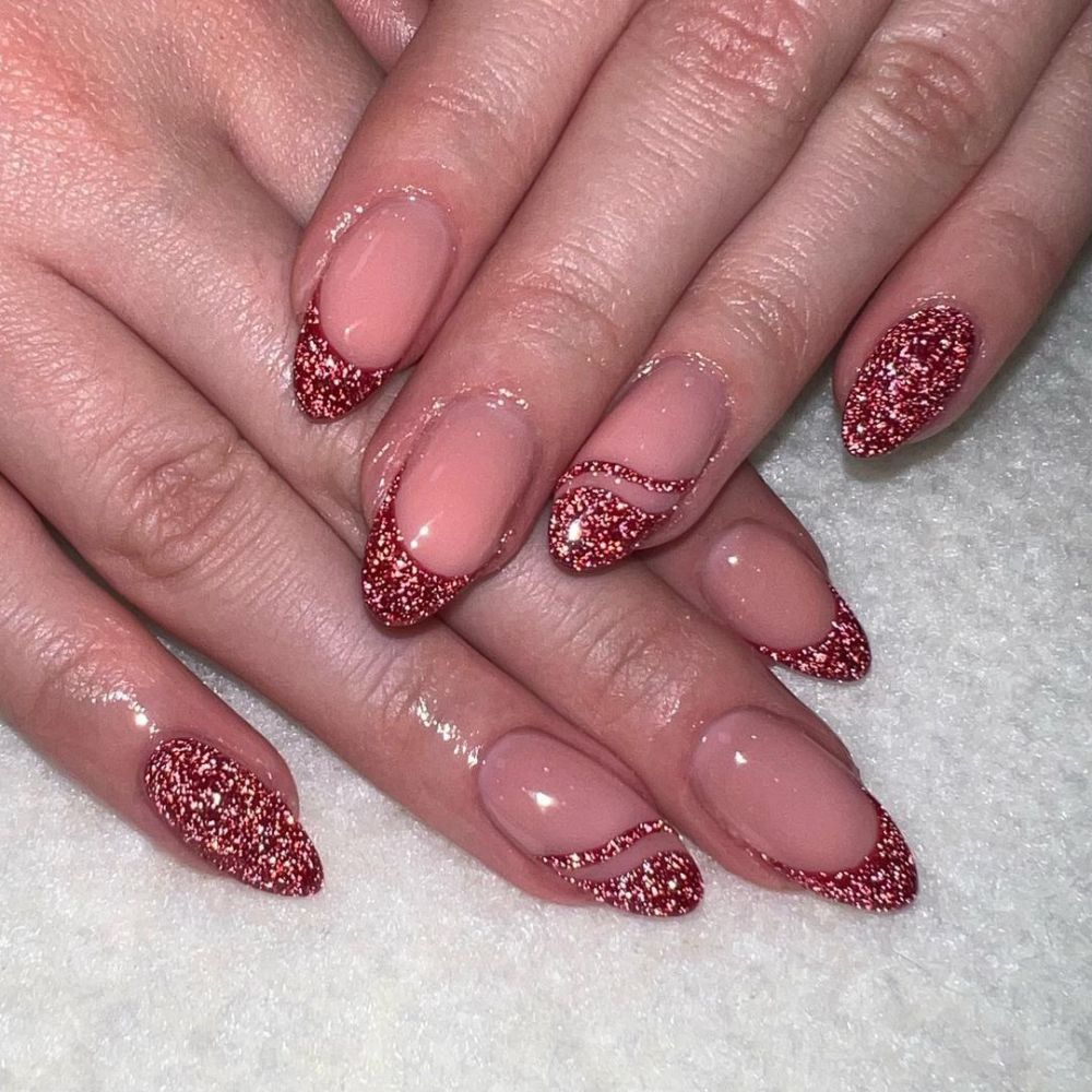 Close up of hands having Christmas red nails with Red French and Lines