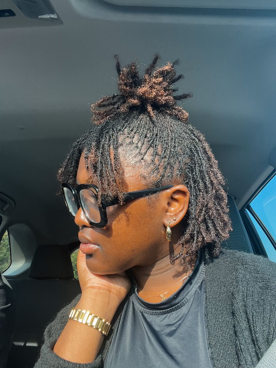 a lady showing the side view of her hairdo