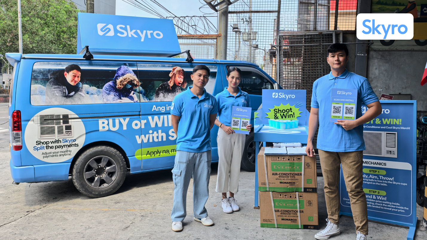 A group of people standing in front of a blue van

AI-generated content may be incorrect.