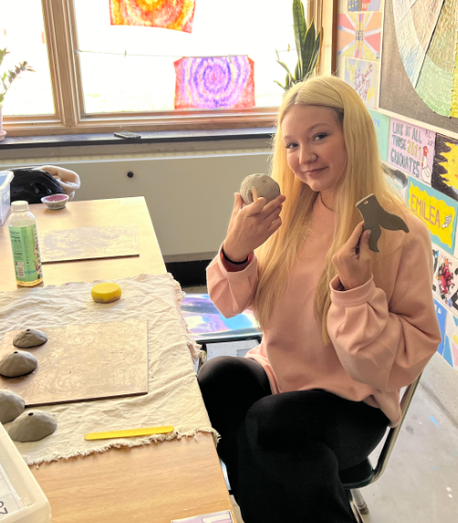 image of a student in ceramics class