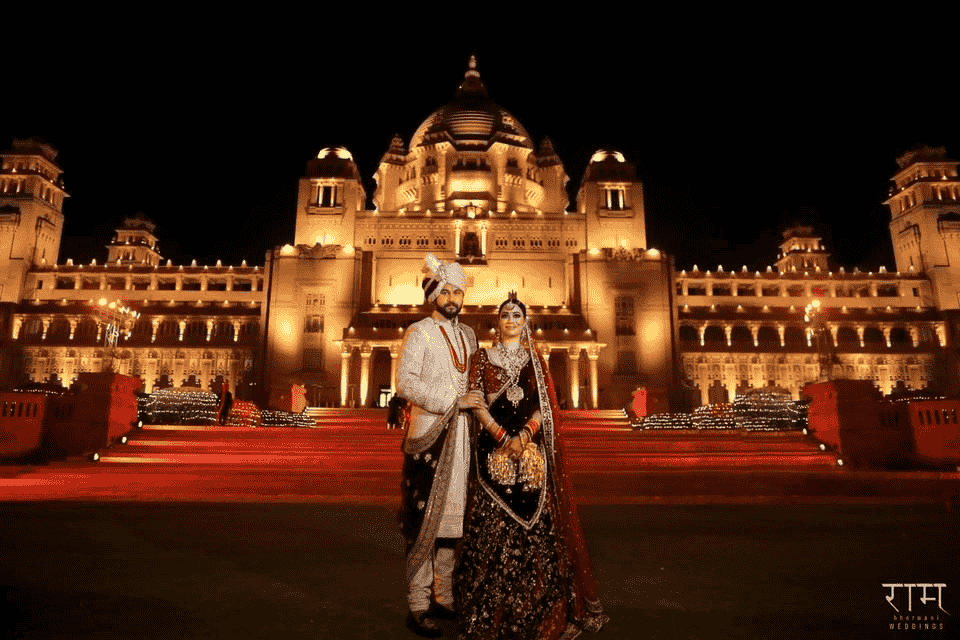 Pre-wedding shoot with couple gazing at the iconic Blue City streets in Jodhpur