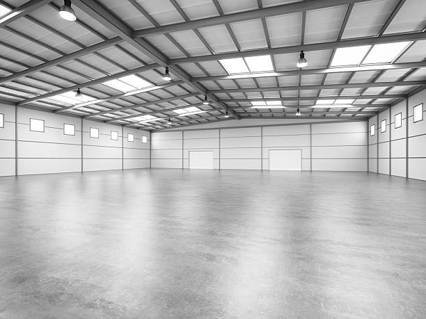 Distribution Warehouse With Cardboard Boxes On The Racks And On The Floor