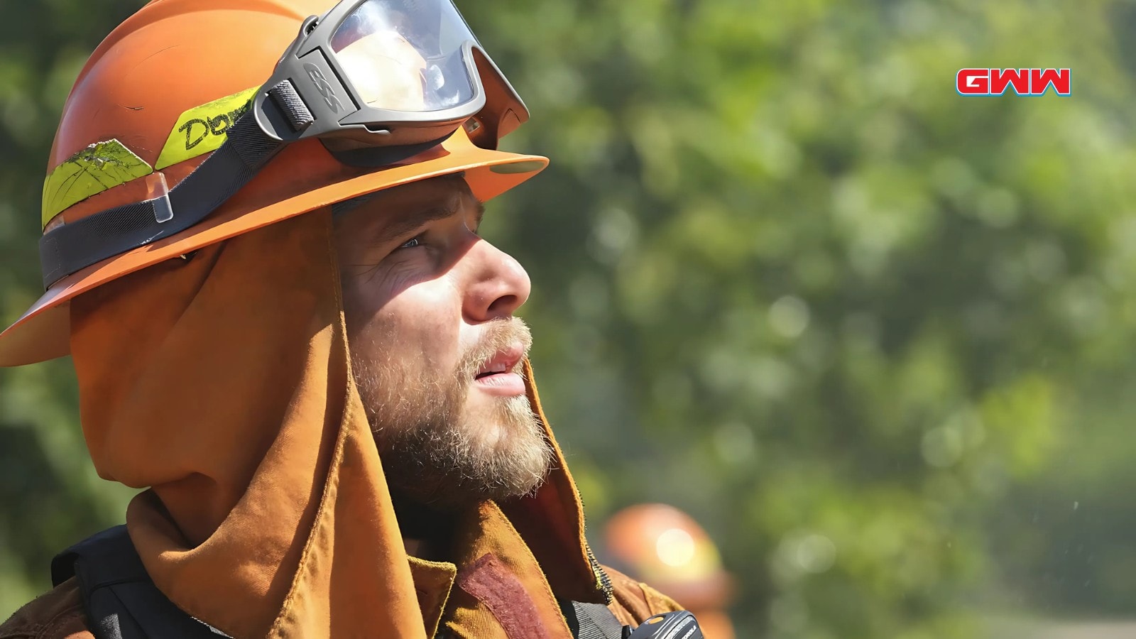 Max Thieriot in fire gear looking up in Fire Country