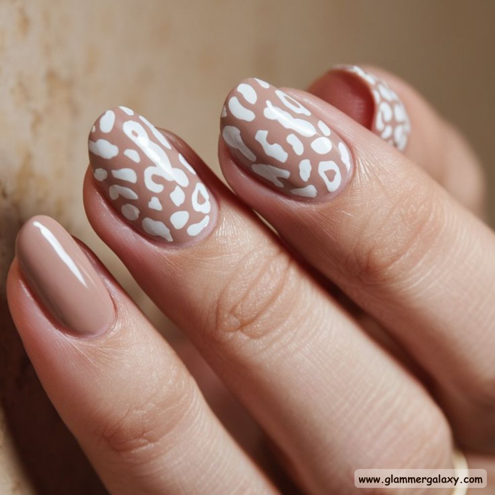 Neutral Leopard Print Nails having Chic Nude and White Leopard Glam
