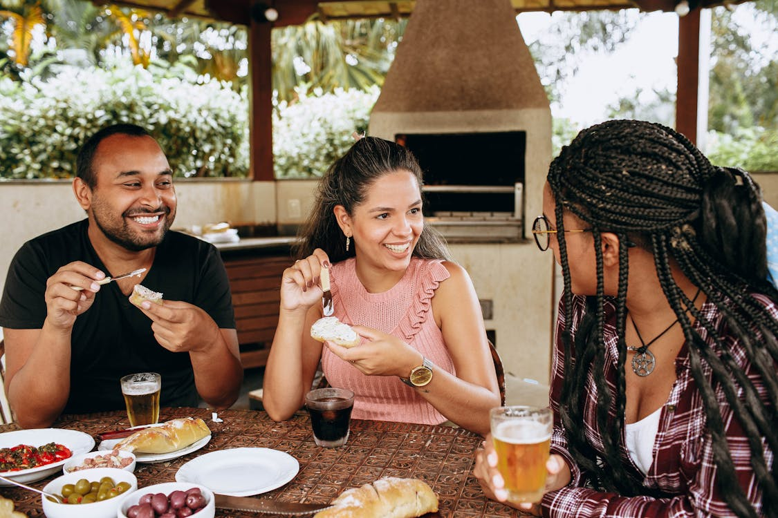 Local explorers eating at a restaurant using a loyalty program