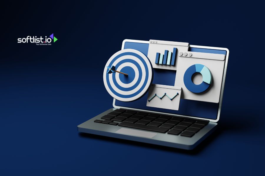 Laptop displaying data charts and target graphics.