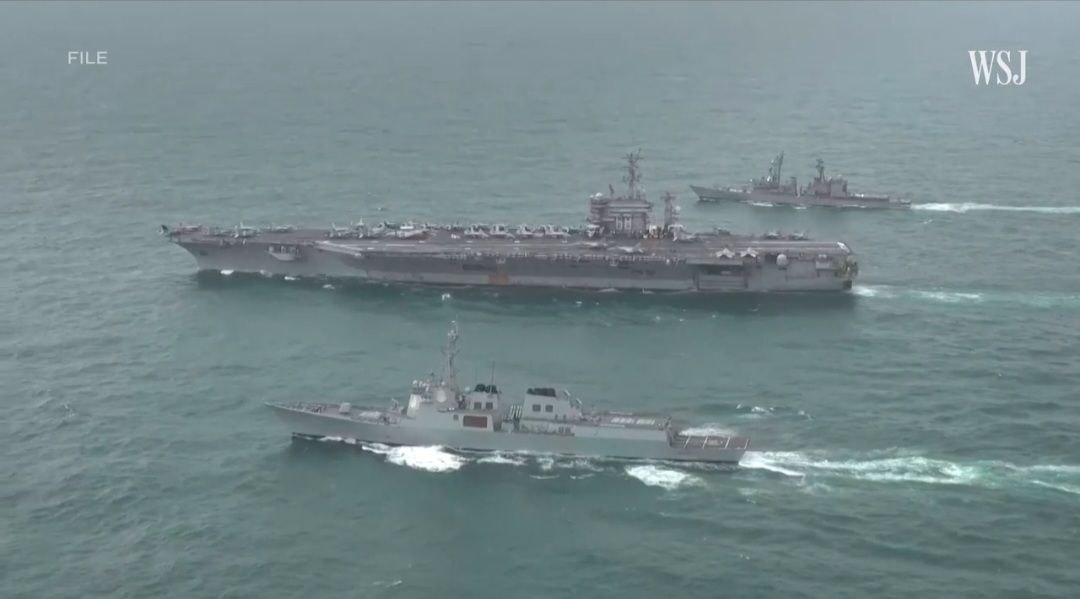 Several ships in the water

AI-generated content may be incorrect.