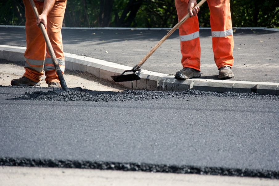 Building Strong Foundations: Essential Services for Commercial Outdoor Surface Construction