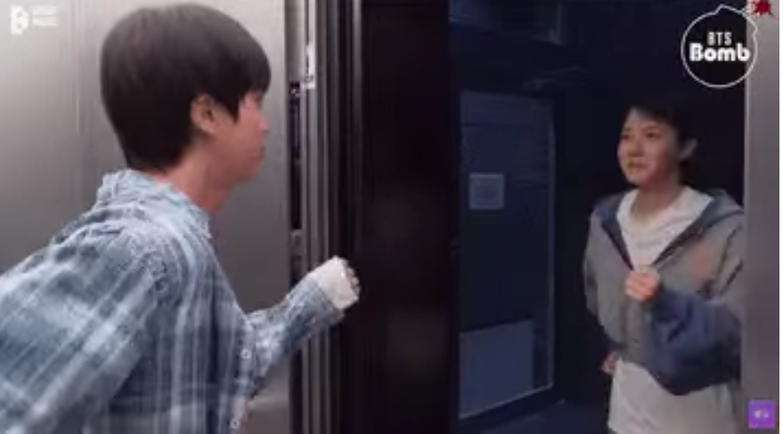 This contains an image of BTS Jin and J-Hope in an elevator