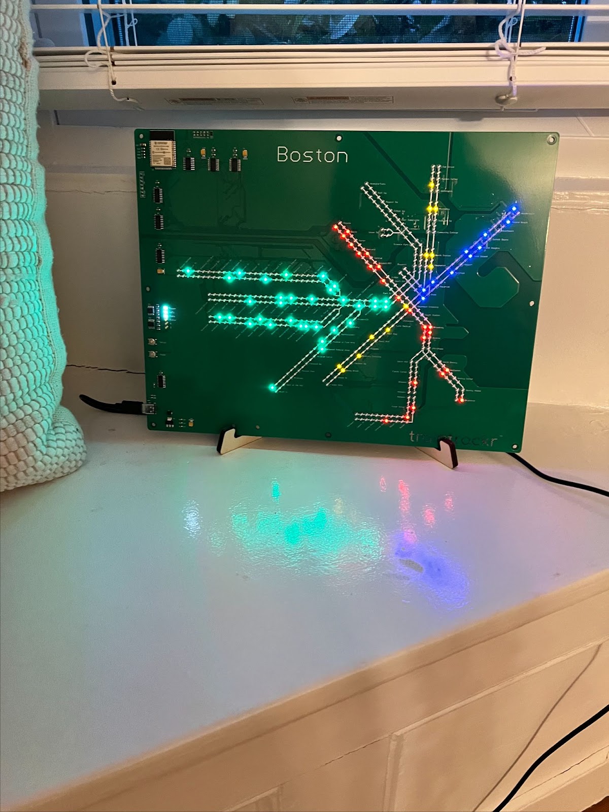 Map of Boston T lines with lights colored to match train line color.