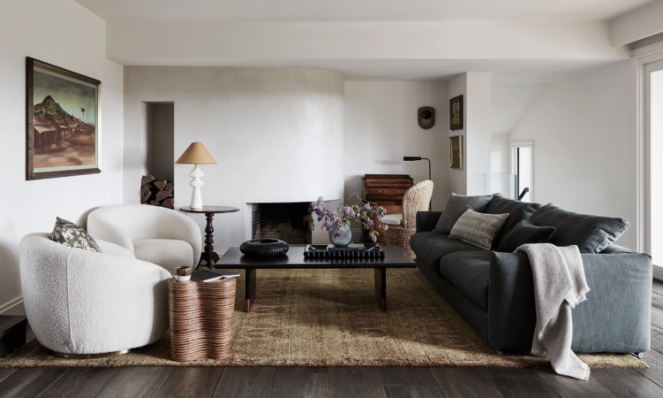 A welcoming living room with a clean aesthetic and plush furnishings