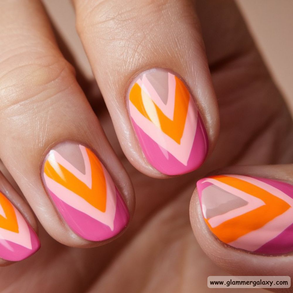 End of Summer Nails having V-Shaped French in Orange & Pink