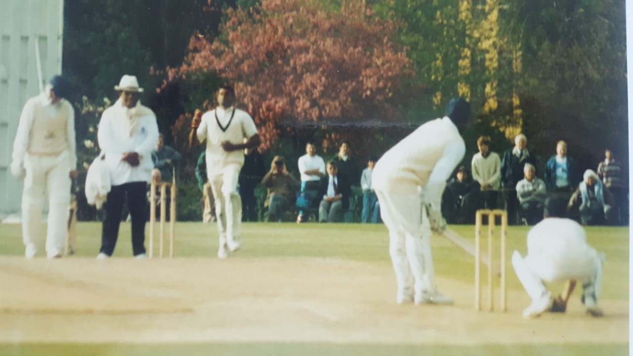 Michael Jeh bowls to the legendary Viv Richards during a match.