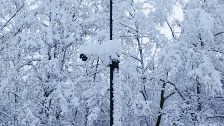 Security camera covered with snow 