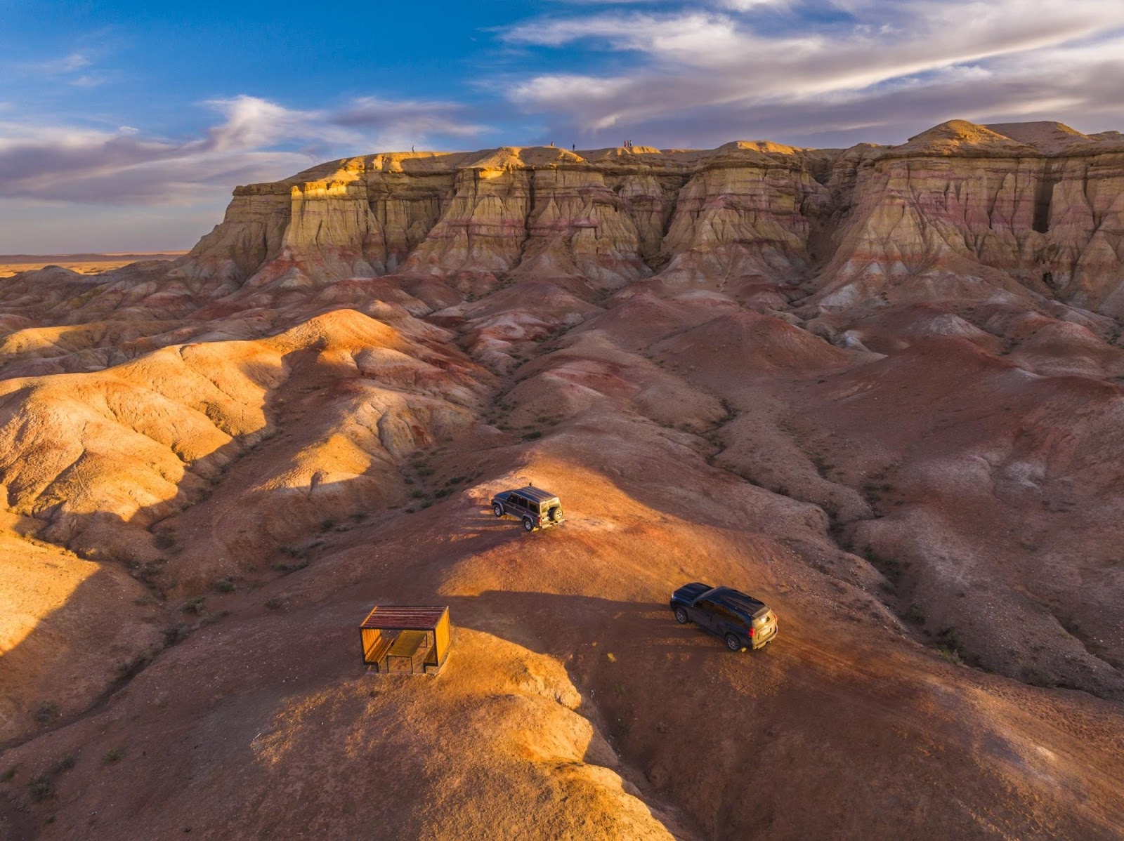 Rent a private car to visit Mongolia's iconic Flaming Cliffs.