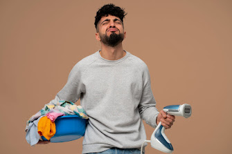 A man feels laundry stressful