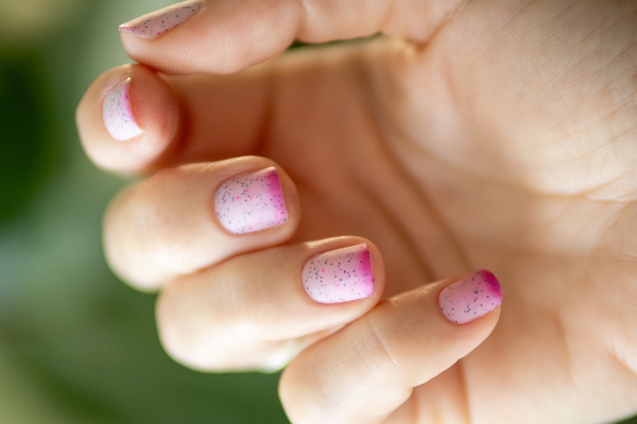 Confetti tips add a festive, colorful upgrade to classic French nail tip design.