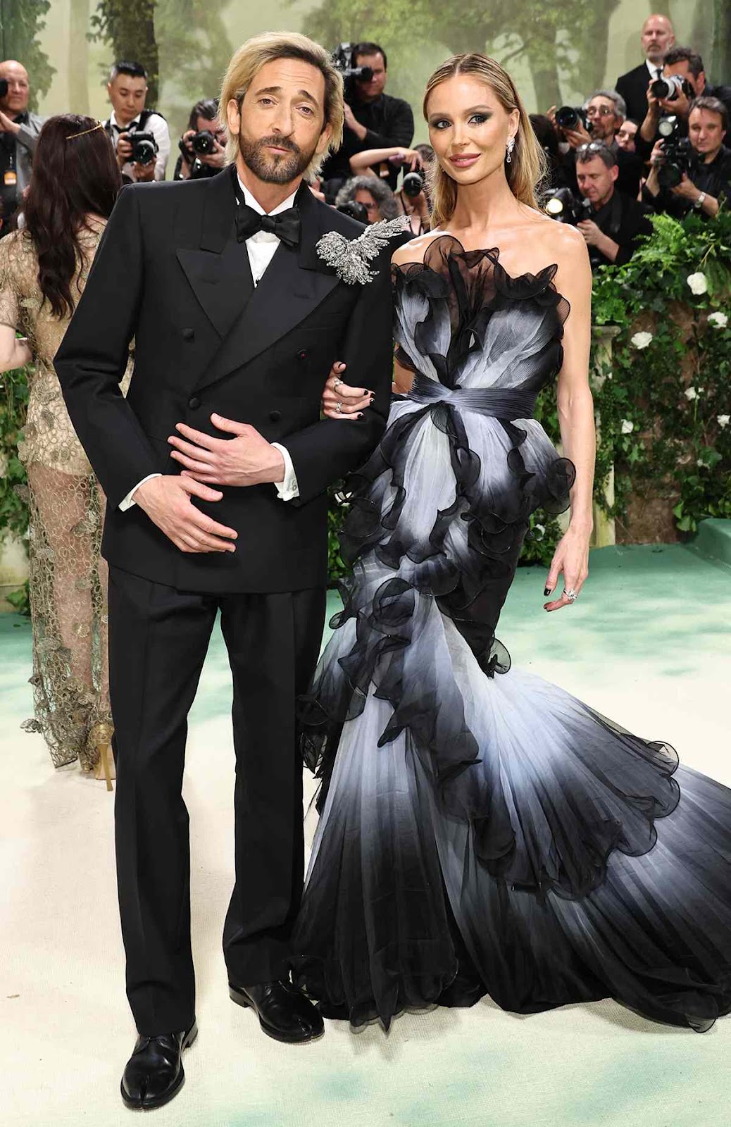 Adrien Brody and Georgina Chapman attend The 2024 Met Gala Celebrating 'Sleeping Beauties: Reawakening Fashion' at The Metropolitan Museum of Art on May 06, 2024 in New York City. 