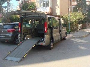 A van with a ramp

Description automatically generated