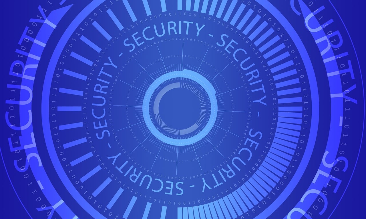 A digital image of a circular graphic with the word "SECURITY" repeated multiple times around it, set against a blue background with binary code elements.