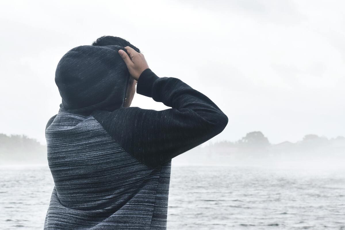 A person wearing a hoodie

