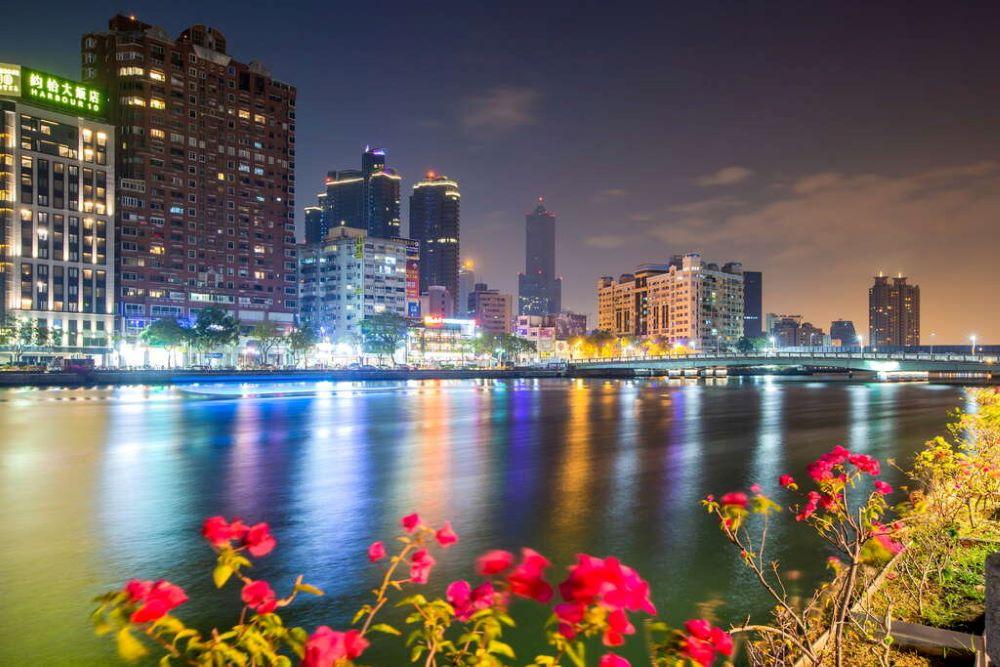 A city skyline with a body of water AI-generated content may be incorrect.