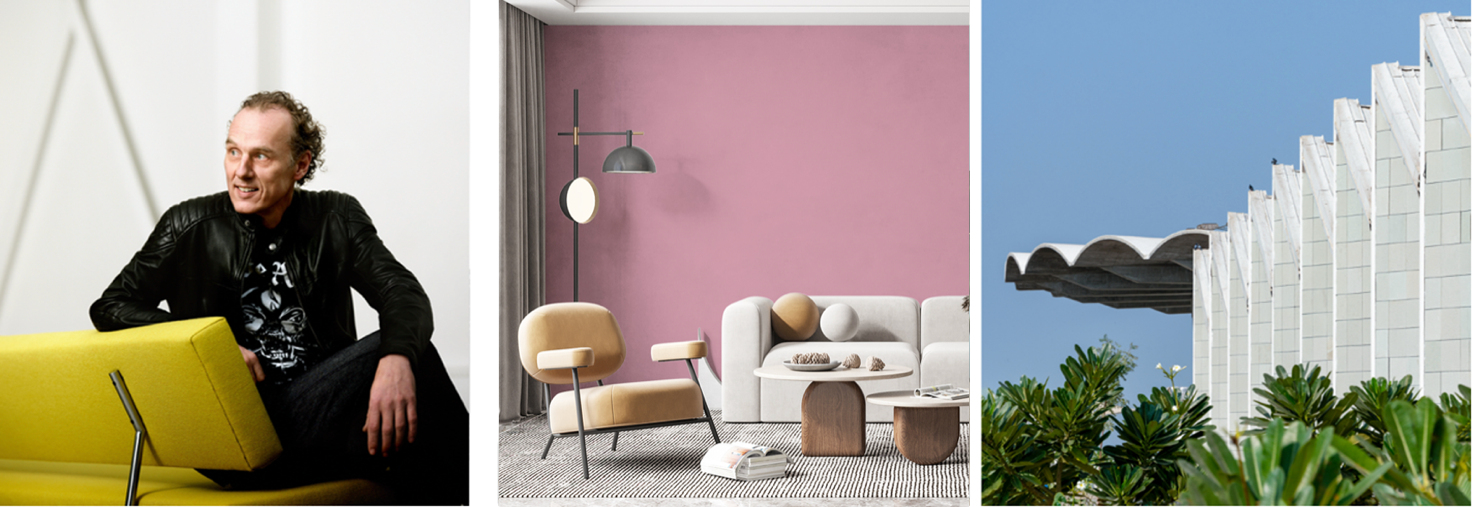 A room with a pink wall and a couch

Description automatically generated