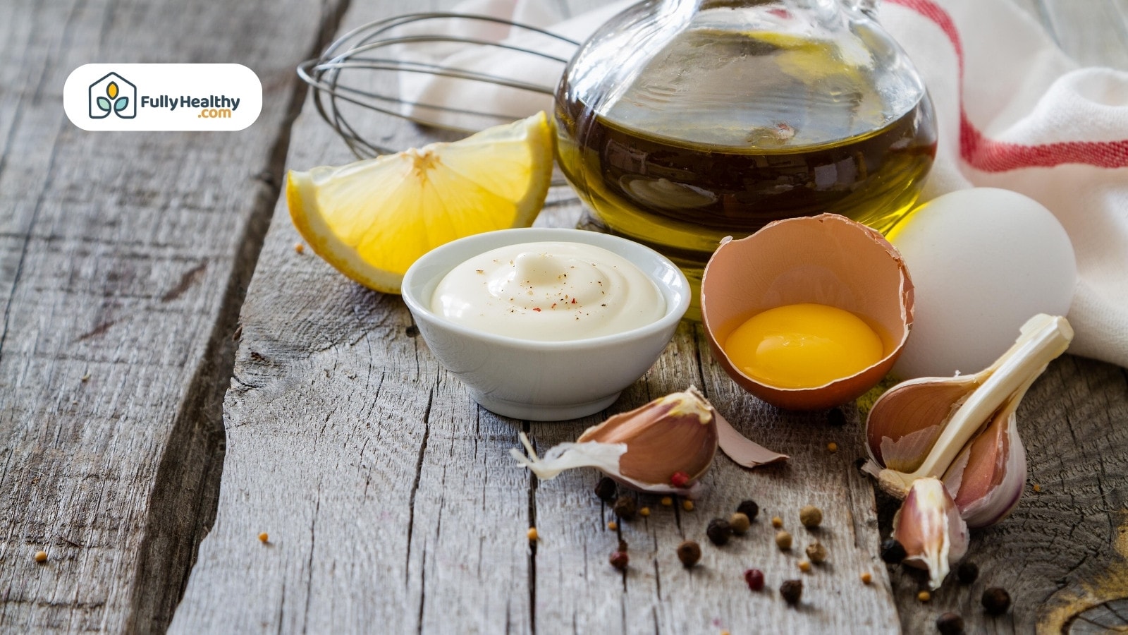 Mayonaise ingredients on a wood table