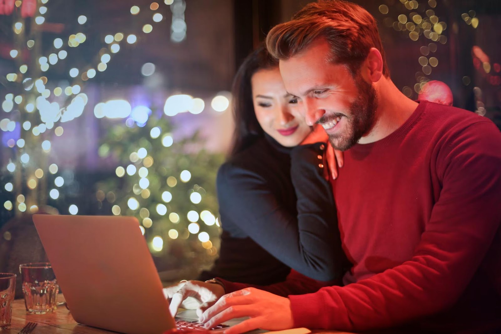 man and woman at laptop