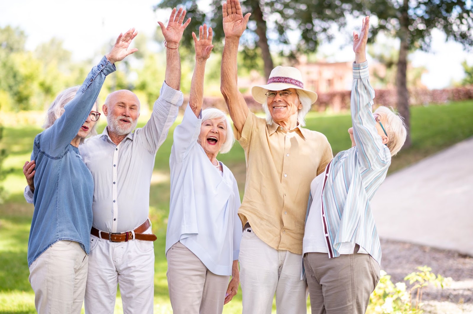 A group of seniors enjoy themselves together outdoors