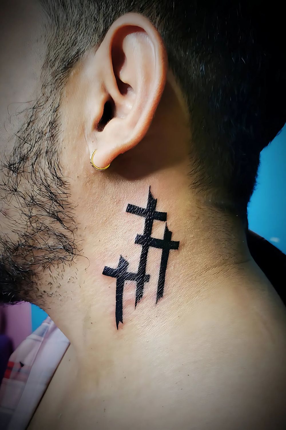 Meaningful Cross Neck Tattoo